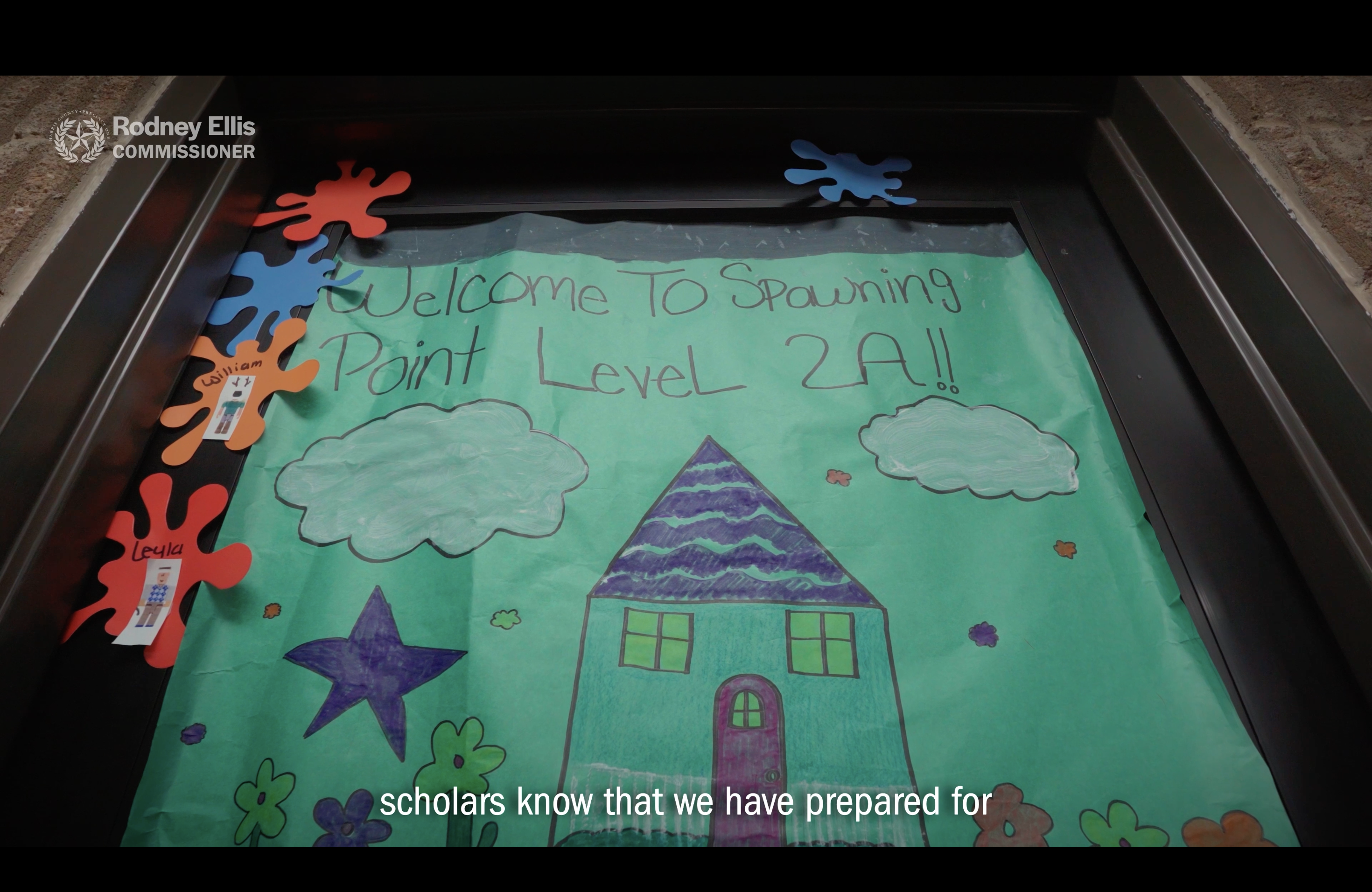 Classroom door decorated with a "Welcome to Spawning Point Level 2A" sign for HYPE Freedom Schools