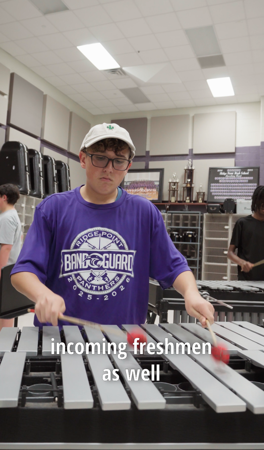 Ridge Point High School Band Guard member playing marimba during movement camp